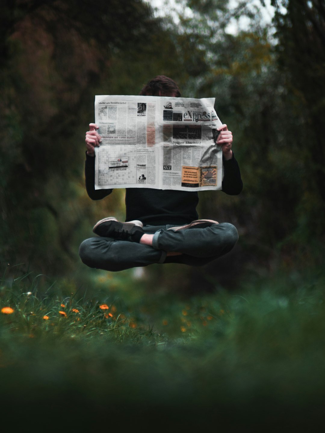 person reading newspaper