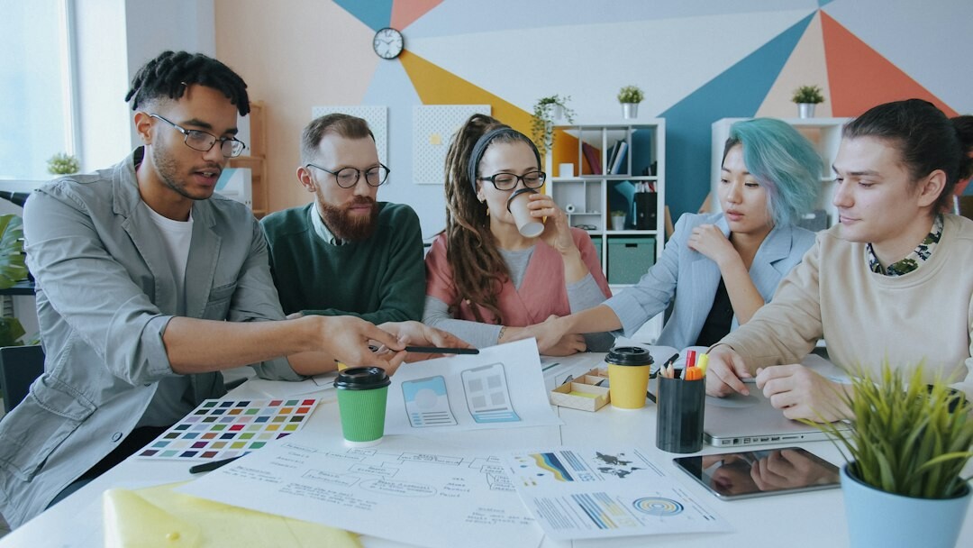 group of young people discussing trends