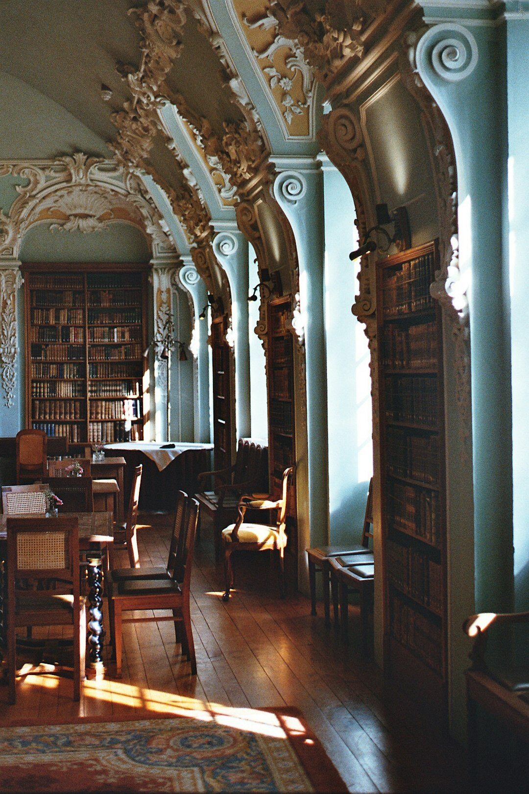 Elegant library reading room with bookshelves